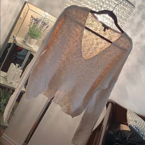 A cream cut sweater